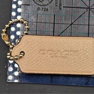 Coach Tan Leather Hang Tag